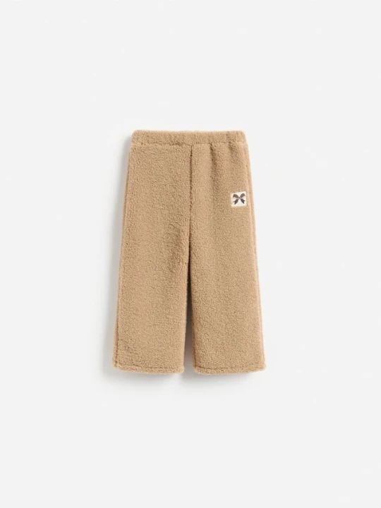 Foto del prodotto Reserved - Pantaloni in shearling sintetico - beige