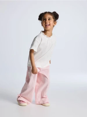 Foto del prodotto Reserved - Pantaloni in cotone con ricami traforati - rosa pastello